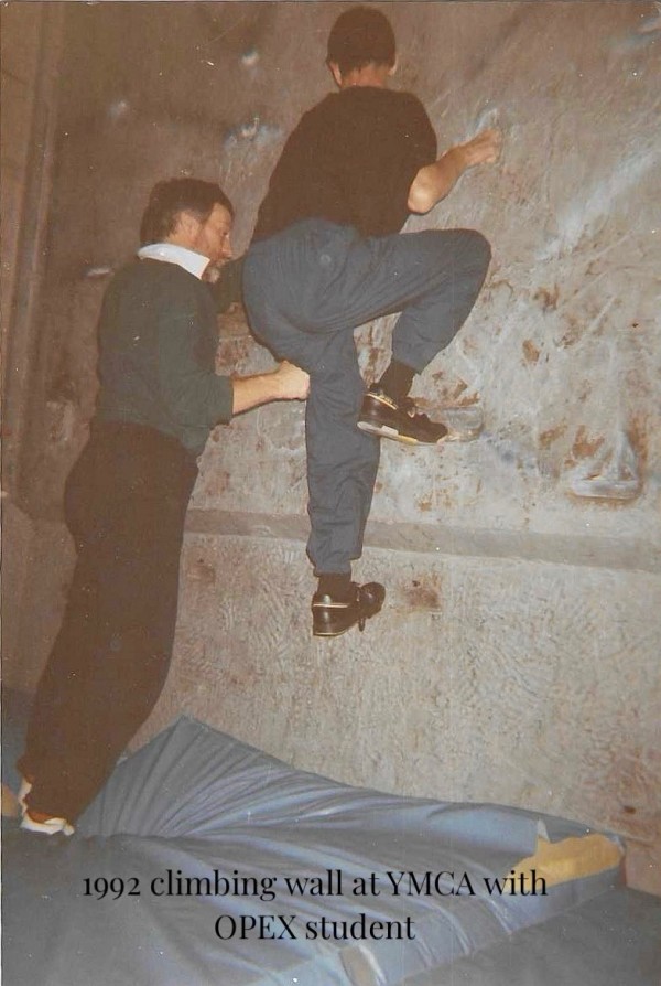 An OPEX student scaling the YMCAs climbing wall (1992) An OPEX student scaling the YMCAs climbing wall (1992)